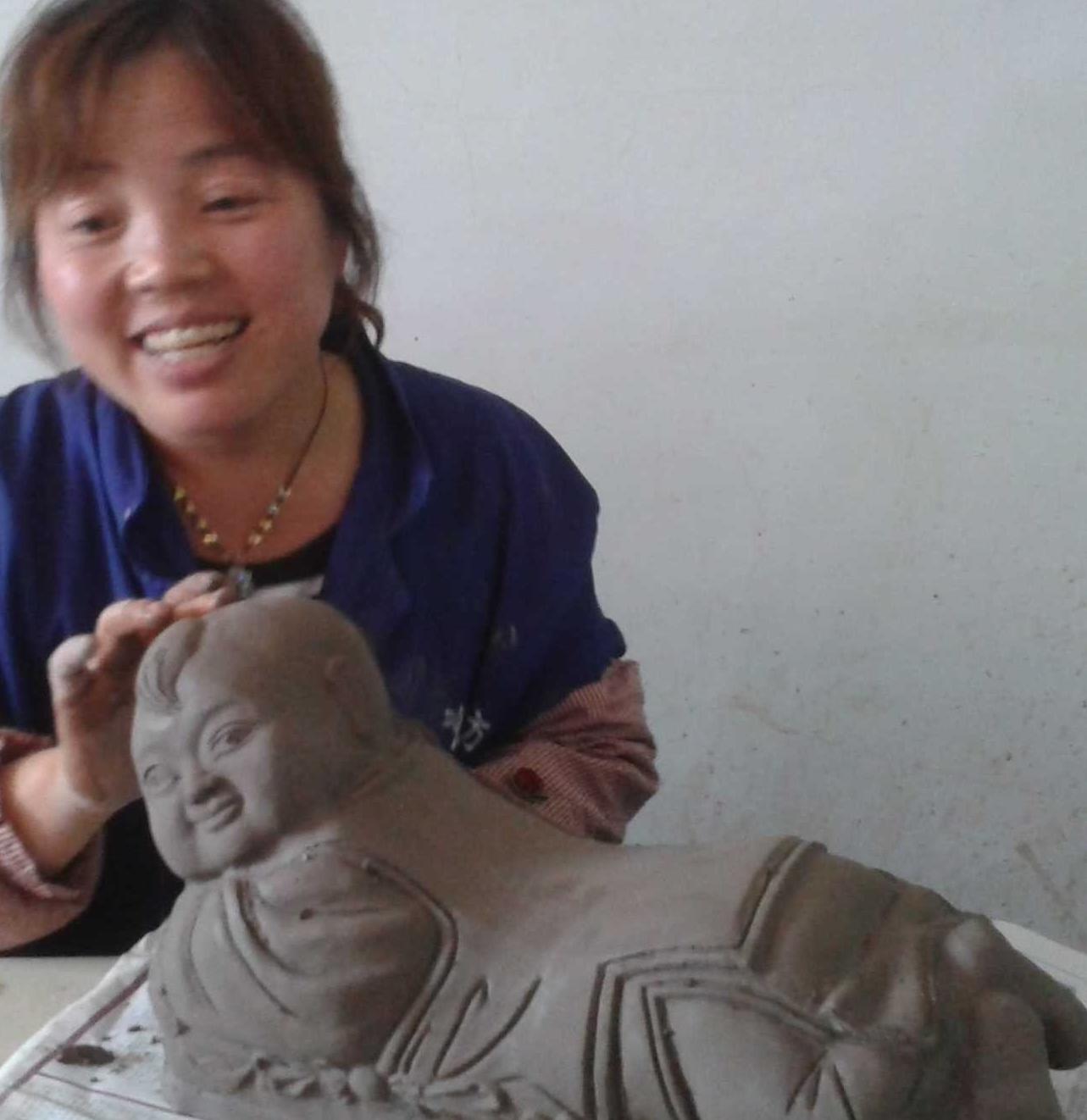 泥枕与雕师 任爱英摄影作品